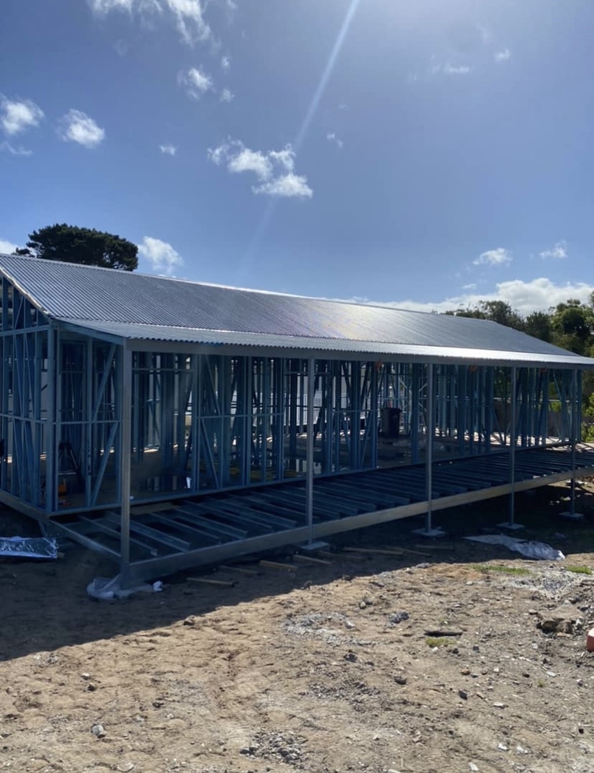 New roof sheeting fixed over a steel-framed house
